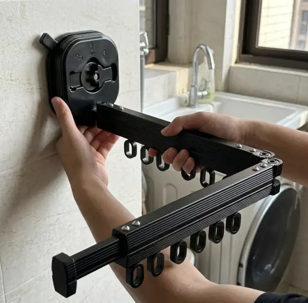 Qinux Hangeroox mounted on a laundry-room wall next to the sink